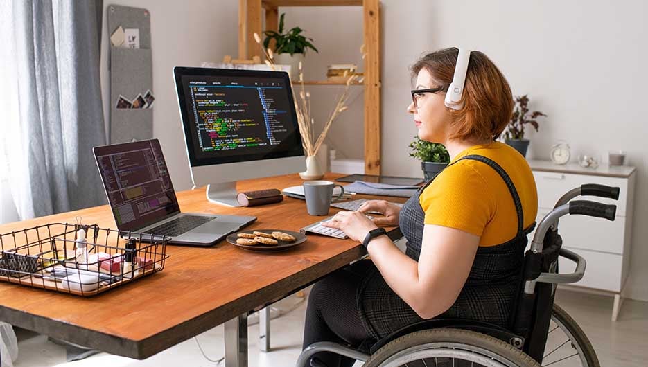 woman wheelchair working